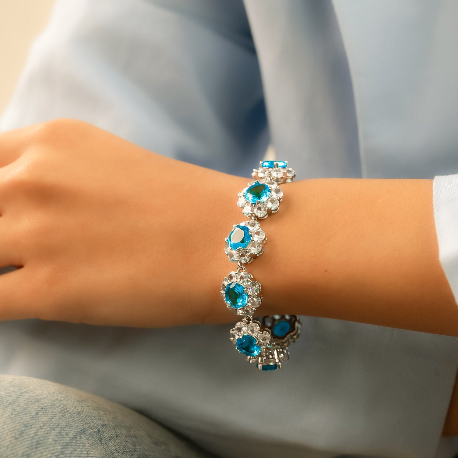 Blue Blossom Statement Bracelet – Silver Floral CZ Bracelet with Ocean Stones - Vinni’s Jewelry